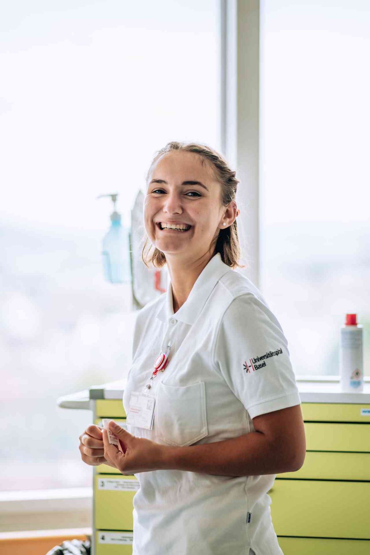 young laughing woman in hospital clothes